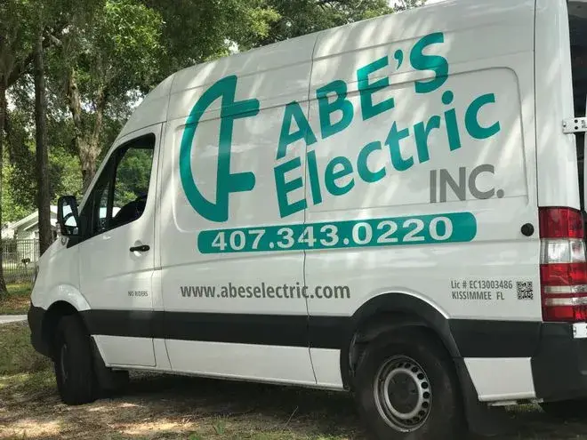ABE'S Electric service van parked by the waterfront in Kissimmee, Florida