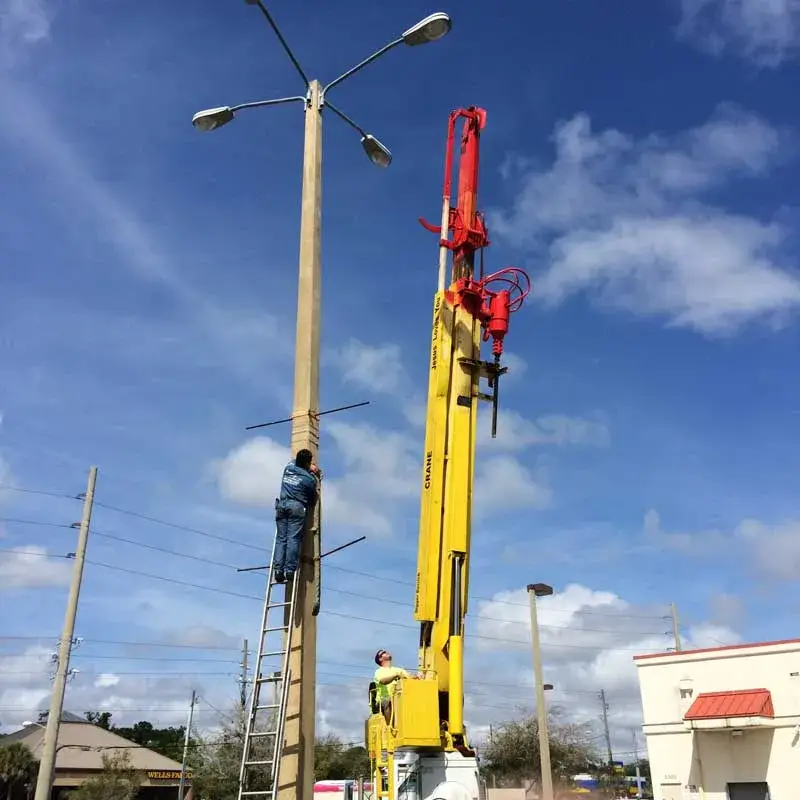 Commercial parking lot light installation by ABE'S Electric
